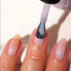 Londontown Lavender Illuminating Nail Concealer brush close-up demonstrates smooth, even coverage.