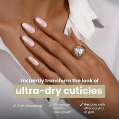 LONDONTOWN Nourishing Cuticle Oil hand in motion massaging cuticles.