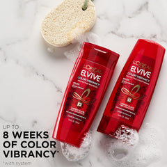 Elvive Color Vibrancy shampoo label close-up reveals anti-fade formula and floral scent