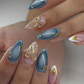 LPOODDNU 3D gold bow nails in almond shape for glamorous at-home styling