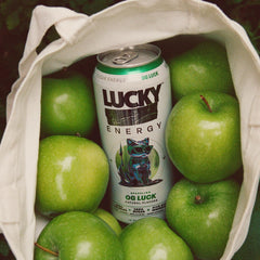 Lucky Energy pour into glass showing crisp finish for post-workout refreshment.