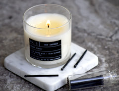 Lulu Candles Jasmine Oud Sandalwood lid and label evoke gift-ready elegance