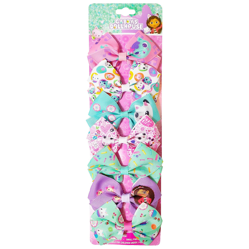 Luv Her Gabby's Dollhouse princess clip secures hair during playful activities.
