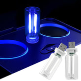 LYCARESUN blue glass bottle night light illuminates car interior with soft ambient glow