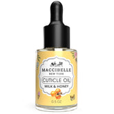 Maccibelle Cuticle Oil bottle with milk and honey scent for soothing moisture.