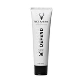Mad Rabbit Defend sunscreen tube packaging showing mineral protection for tattoos.