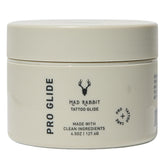 Mad Rabbit Tattoo Artist Glide bottle shows clean vegan formula for smooth tattooing