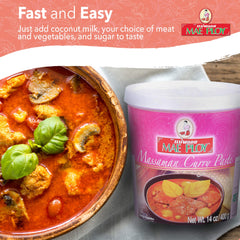 Mae Ploy Massaman curry dish served steaming with vibrant sauce