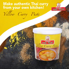 Mae Ploy Yellow curry paste ingredients closeup highlights lemongrass and herbs.