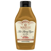 Maille x Mike’s Hot Honey Dijon bottle pouring to show bold sweet-spicy flavor