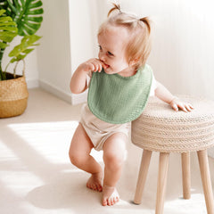 MairMore bib used as a burp cloth for post-meal cleanups