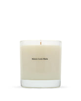 Maison Louis Marie No.04 Bois de Balincourt candle wax pool enhances even burning ambiance.