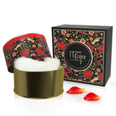 Maja perfumed talcum powder bottle delivers a silky, long-lasting feel.