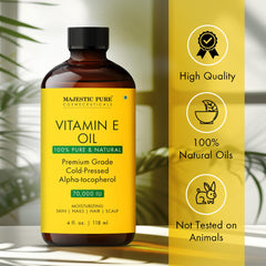 Majestic Pure Vitamin E Oil in hand ready for face and body care.