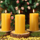 MAKALONE honeycomb beeswax rolled pillar candle in a three-pack for warm ambiance.