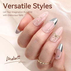 Makartt chrome gold art design on nails highlighting metallic accents.