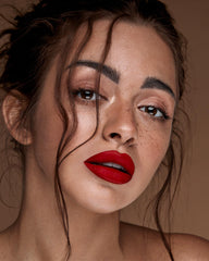 MAKI YIKA Red Lipstick on lips with a matte long lasting look