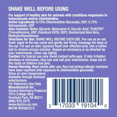 Pouring Mal-A-Ket Plus TrizEDTA flush for quick ear cleansing.