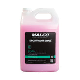 Malco Showroom Shine bottle pour showing quick dust removal on a car.