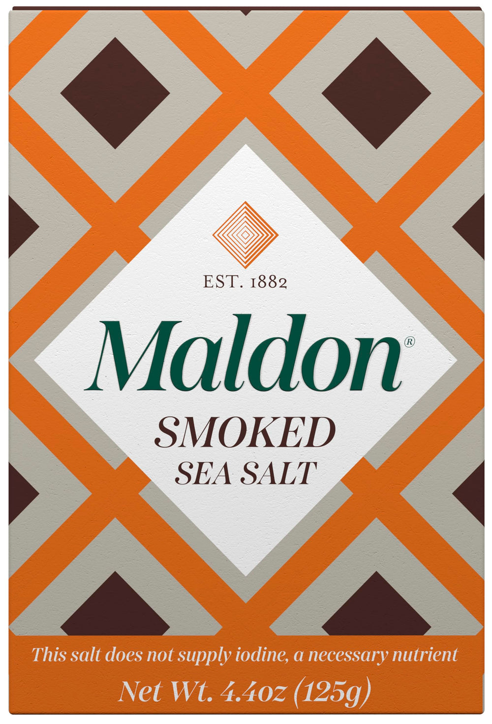 Maldon smoked sea salt flakes bottle closeup enhances flavor with hand-harvested precision.