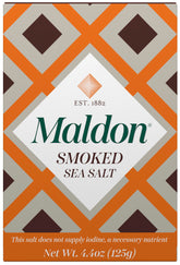 Maldon smoked sea salt flakes bottle closeup enhances flavor with hand-harvested precision.