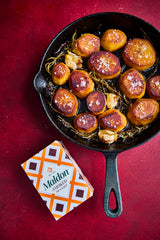 Maldon smoked sea salt flakes on chicken highlighting smoky flavor enhancement