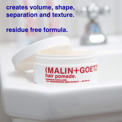 MALIN+GOETZ Hair Pomade end smoothing shows sleek ends and healthy-looking shine.