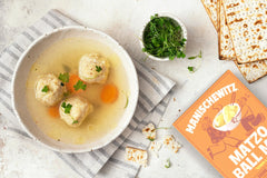 Prepared matzo balls from Manischewitz mix simmering to perfection in broth.