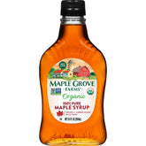 Maple Grove Farms pure maple syrup bottle ready to drizzle on pancakes