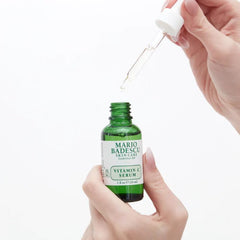 Applying Mario Badescu Serum on skin for radiant glow