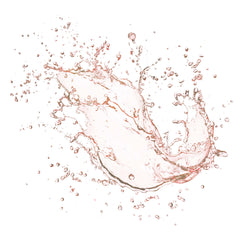 Close-up of Mario Badescu toner bottle highlighting rose scent and freshness
