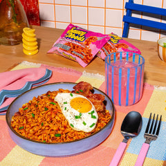 Maruchan Saucy Noods sauce-drenched noodles showing creamy heat.