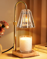 Marycele candle warmer lamp with wood base and gold body for elegant scent diffusion.
