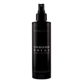 Mavwicks Enchanted Rouge bottle pour delivering a lasting fragrance for linens and spaces.
