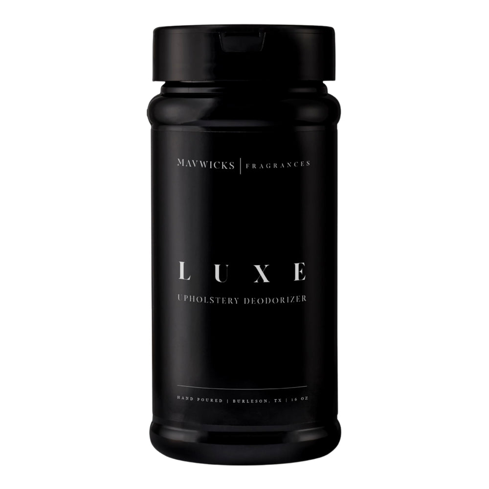 Mavwicks Luxe Upholstery Deodorizer 16oz bottle releasing fresh fabric fragrance
