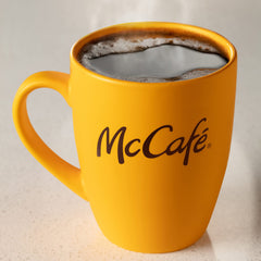 McCafé air-tight canister seals in freshness for consistent flavor.