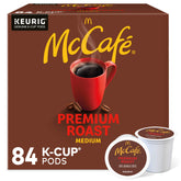 McCafé Premium Roast pods 84-count pack on a kitchen counter for easy mornings.