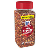 McCormick Crushed Red Pepper bottle pouring heat for pizza and eggs