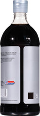 McCormick Culinary imitation vanilla being poured; ideal for quick breads and beverages.
