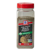 McCormick Organic Black Pepper bottle on kitchen counter for everyday seasoning.