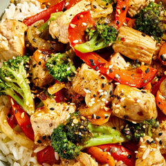 Sizzling stir-fry topped with McCormick Sesame Ginger Crunch