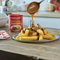 McDonnells curry sauce label close-up, highlights ingredients and origin.