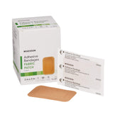 McKesson adhesive fabric bandage closeup shows secure adhesion and breathable material.