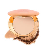 MCoBeauty Miracle Flawless powder compact with mirror for quick touch-ups.