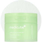Medicube Exosome CICA Tea Tree toner pads bottle pour for calming hydration.