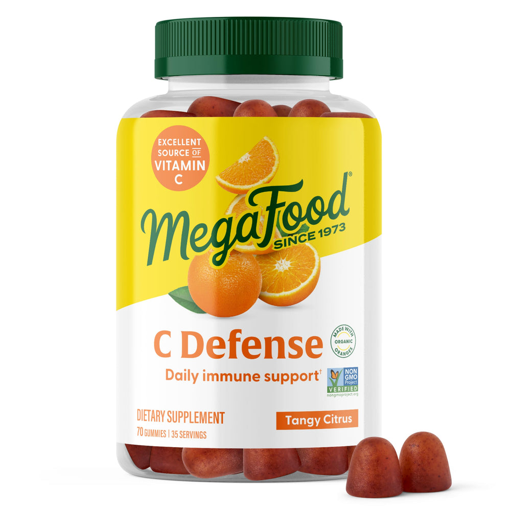 MegaFood C Defense bottle on countertop, convenient daily immune support in chewable form.