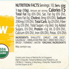 Spoonful of Mekhala Yellow Curry Paste highlighting concentrated, versatile paste