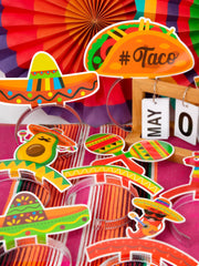 Melisheer patterned headbands with foil accents elevate fiesta-themed decor.