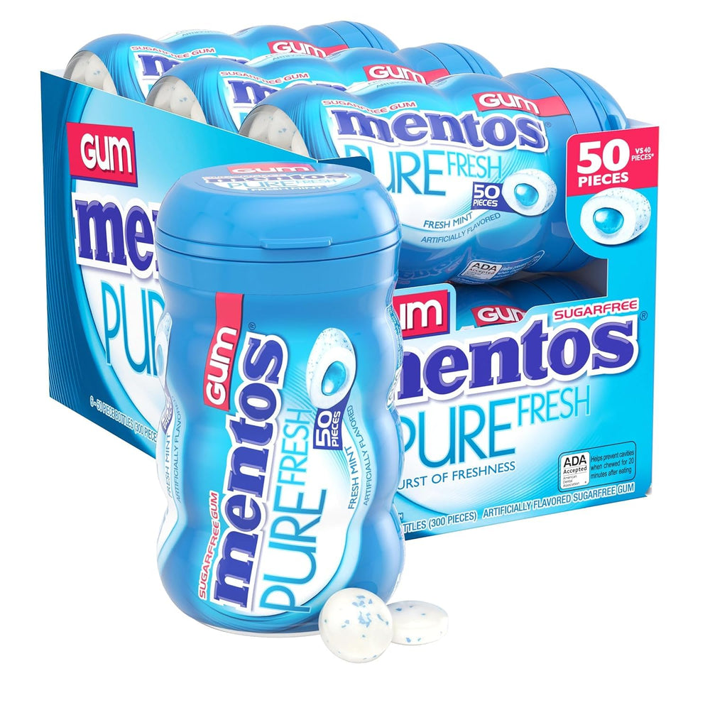 Mentos Pure Fresh gum bottle on desk for long-lasting mint flavor
