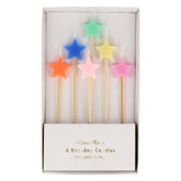 Meri Meri star candles on a cake with wooden sticks, ideal for quick festive upgrades.